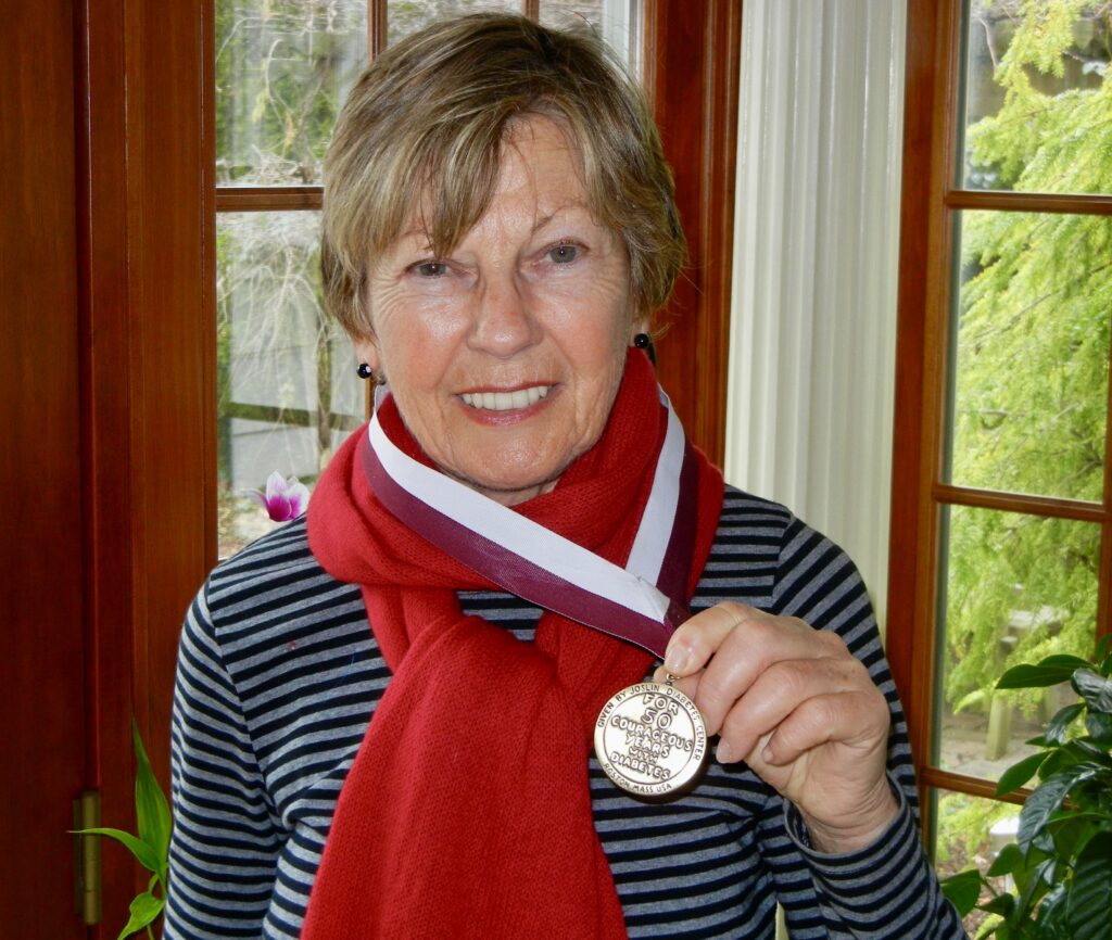 Judith with her 50 year medal from Joslin Diabetes Center.